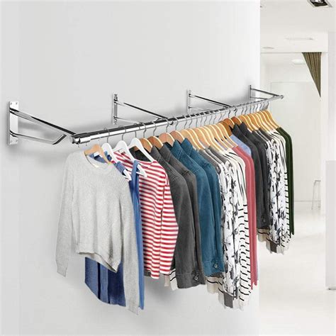 clothes hanging wall mount|wall mounted clothes hanging rails.